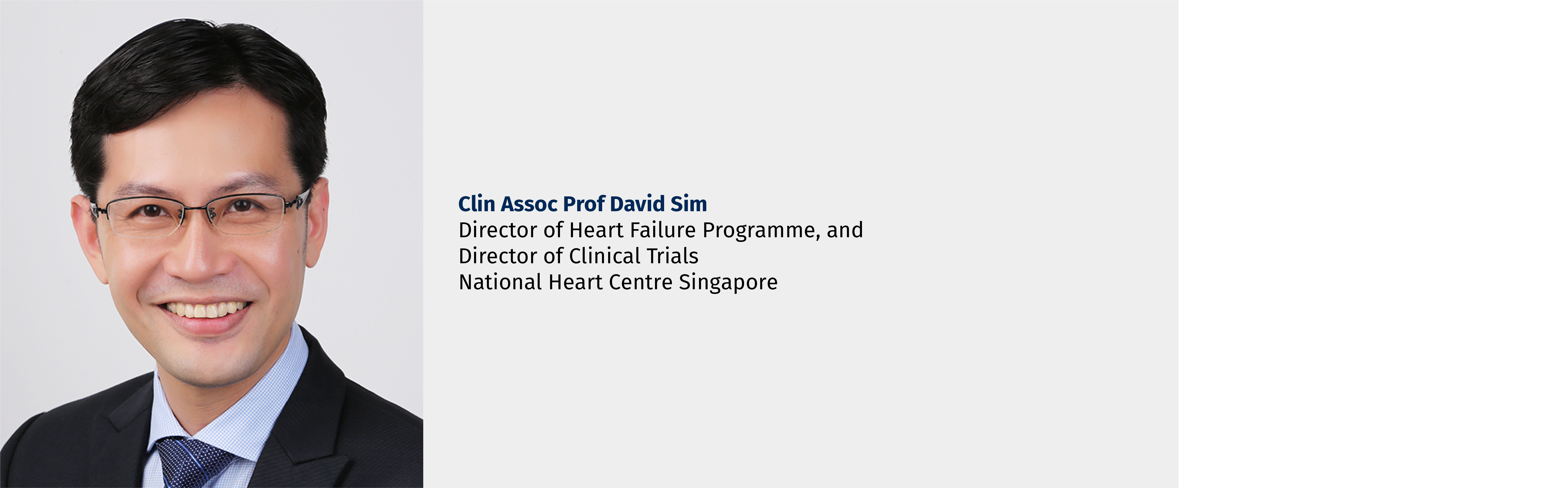 Smiling man in glasses and dark suit, identified as Clin Assoc Prof David Sim, National Heart Centre Singapore.